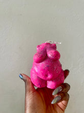 Load image into Gallery viewer, Pink glittery bear-shaped candle held by a hand against a plain background