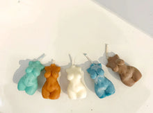 Load image into Gallery viewer, Five colorful nude-shaped candles on a white surface