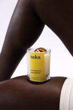 Load image into Gallery viewer, Seka candle on a person's arm with a white background