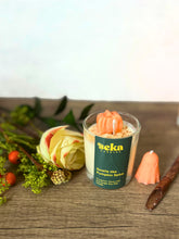 Load image into Gallery viewer, Seka candle with pumpkin spice scent on a wooden surface with decorative elements
