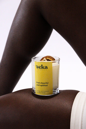 Seka candle on a person's arm with a white background